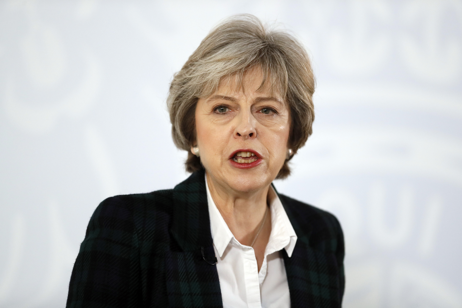 May affirms Brexit will lead to freer British trade