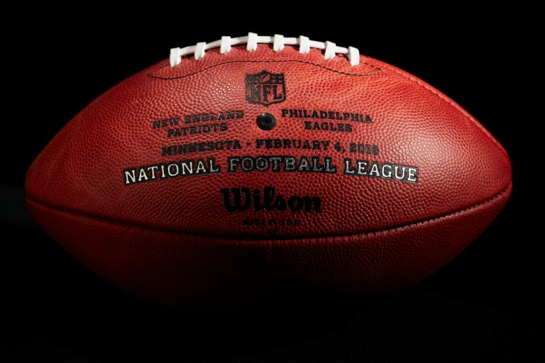 An official ball for the NFL Super Bowl LII football game from the Wilson Sporting Goods Co. in Ada, Ohio, is displayed Monday, Jan. 22, 2018. The New England Patriots will play the Philadelphia Eagles in the Super Bowl on Feb. 4, in Minneapolis, Minn. (AP Photo/Rick Osentoski)