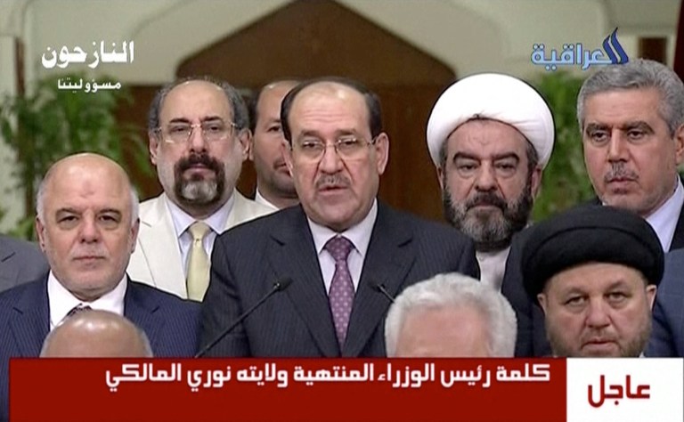 Iraq’s al-Maliki gives up post to rival