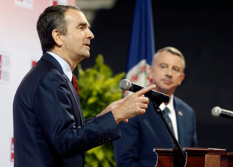Democratic candidate for governor, Lt. Gov. Ralph Northam, left, gestures during a debate with Republican challenger Ed Gillespie at the University of Virginia-Wise in Wise, Va., Monday, Oct. 9, 2017. (AP Photo/Steve Helber)