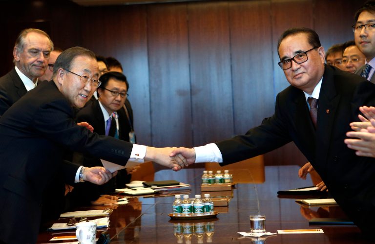 North Korean Foreign Minister Ri Su Yong, right, shakes hands with United Nations Secretary-General Ban Ki-moon during a meeting on the sidelines of the 69th session of the U.N. General Assembly at U.N. headquarters, Sept. 27, 2014. (AP Photo/Jason DeCrow)