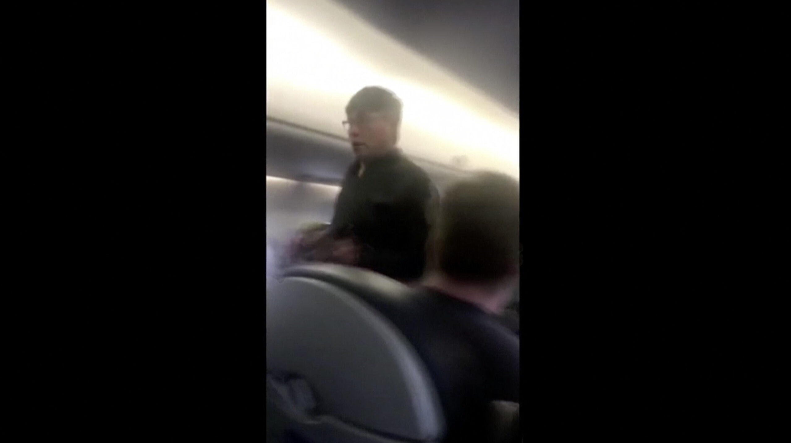 Reporters dig into past of United passenger