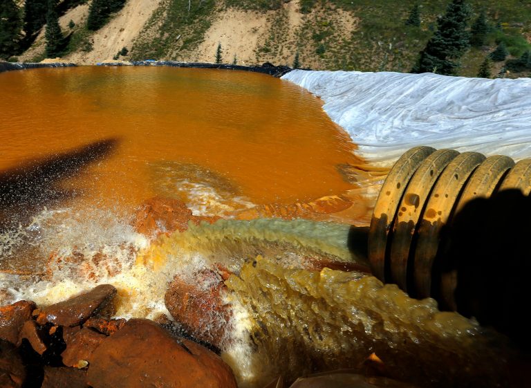 The anniversary of the Gold King Mine spill was also marked by a decision from the EPA inspector general and the Justice Department to launch a criminal probe into the spill, which may have spurred the Navajo to sue. (AP Photo)