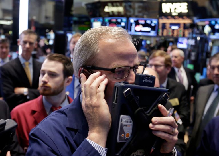 FILE - In this Friday, May 2, 2014 file photo, trader David O'Day works on the floor of the New York Stock Exchange. U.S. stock futures are trading lower as investors await comments from Federal Reserve Chair Janet Yellen, scheduled to address Congress on the economy. A new report Tuesday, May 6, 2014, shows that housing prices rose in March, but at a slower pace than a month earlier. (AP Photo/Richard Drew, File)
