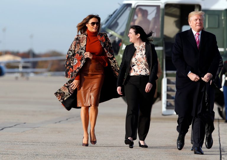 First lady Melania Trump, left, walks with President Donald Trump, as they board Air Force One, as they depart Tuesday, Nov. 21, 2017, at Andrews Air Force Base, Md. Trump is en route to his Mar-a-Largo resort in Florida for the Thanksgiving holiday. (AP Photo/Alex Brandon)