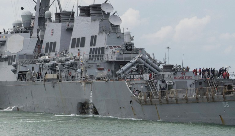 The Navy has suspended its search for the remaining missing USS John S. McCain sailors, 80 hours after the guided-missile destroyer collided with an oil tanker east of Singapore on Monday. (Mass Communication Specialist 2nd Class Joshua Fulton/U.S. Navy via AP)