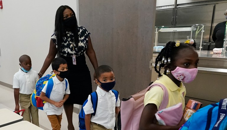 Controversy surrounds eight states that prohibit school mask mandates