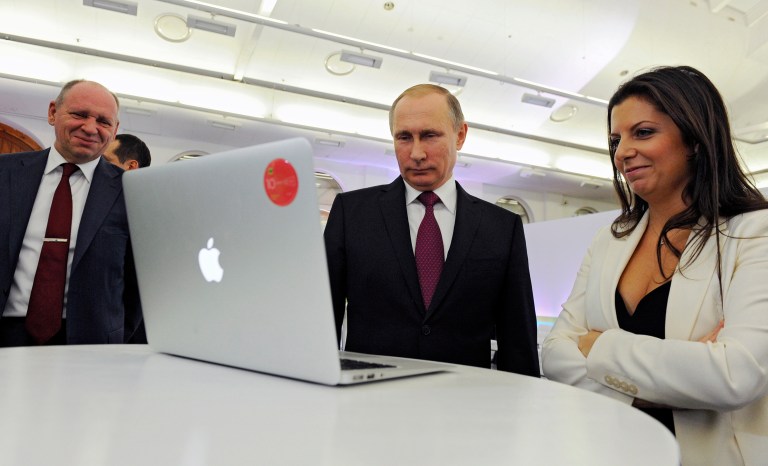 Russian President Vladimir Putin signed into law a measure that allowed his team to shut down pro-democracy organizations operating in the country. (Mikhail Klimentyev/Sputnik, Kremlin Pool Photo via AP)