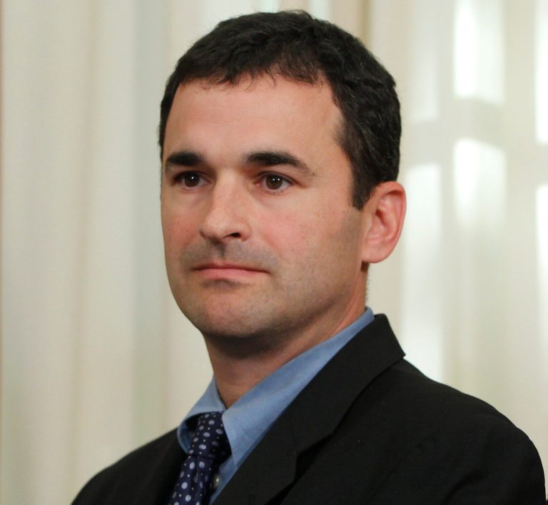 FILE - In this Nov. 9, 2011, file photo then-Controller Danny Werfel of OMB Office of Federal Financial Management watches as President Barack Obama (not shown) signs an Executive Order to cut waste and promote efficient spending across the federal government in the Oval Office at the White House in Washington. Friday May 31st, 2013, Werfel, the new acting Commissioner of the IRS, issued a statement commenting on a report by Treasury Department's Inspector General in which he criticized a $4 million IRS conference in August 2010 in Anaheim, Calif. The report will be released Tuesday. (AP Photo/Charles Dharapak, File)