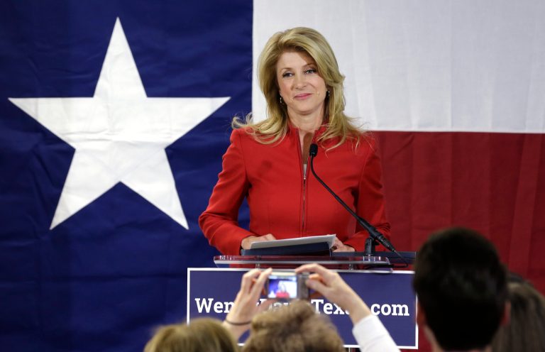 Texas Sen. Wendy Davis announced Wednesday that Karin Johanson, who has managed Davis' underdog bid for Texas governor, has left the campaign and will be replaced by Arlington state Rep. Chris Turner. (AP/LM Otero)