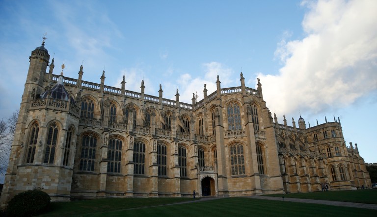 It balances pomp with privacy. (AP Photo/Alastair Grant)