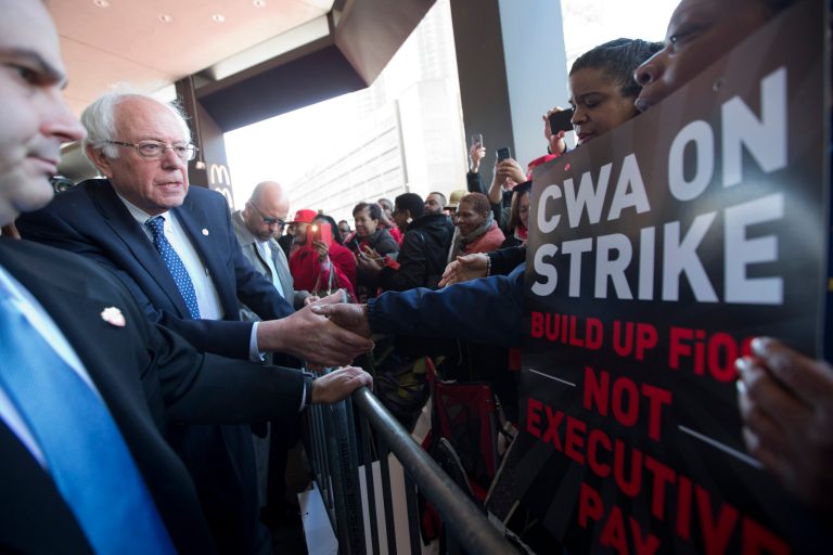 Democratic presidential candidate, Sen. Bernie Sanders, I-Vt., greets a CWA worker at a Verizon workers picket line, Wednesday, April 13, 2016, in the Brooklyn borough of New York. (AP Photo/Mary Altaffer)