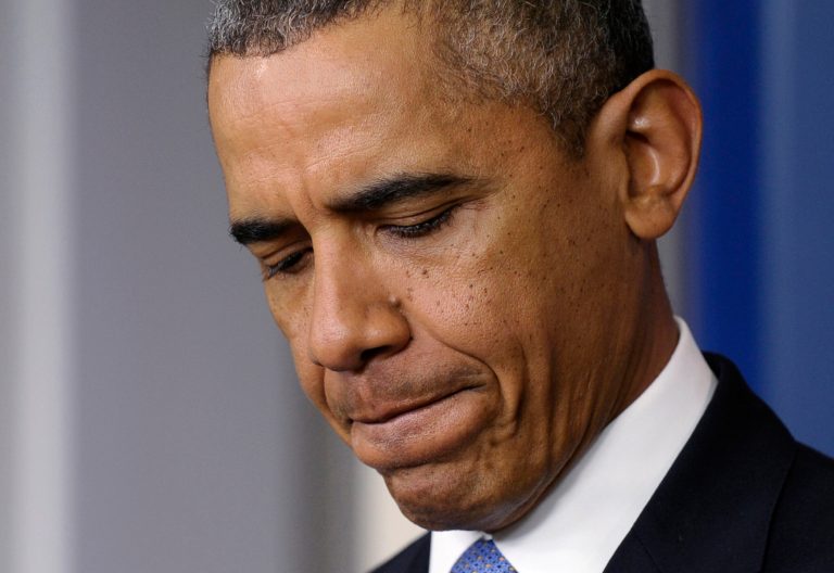 President Obama pauses before speaking about budget issues from the Brady Press Briefing Room at the White House in Washington on Sept. 30. (AP Photo/Susan Walsh)