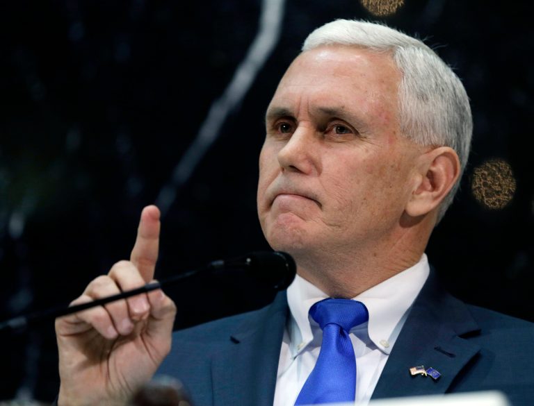 Gov. Mike Pence on Tuesday asked that the federal government expand health care coverage for Indiana's low-income residents using a state-run alternative to traditional Medicaid. (AP Photo/Darron Cummings)