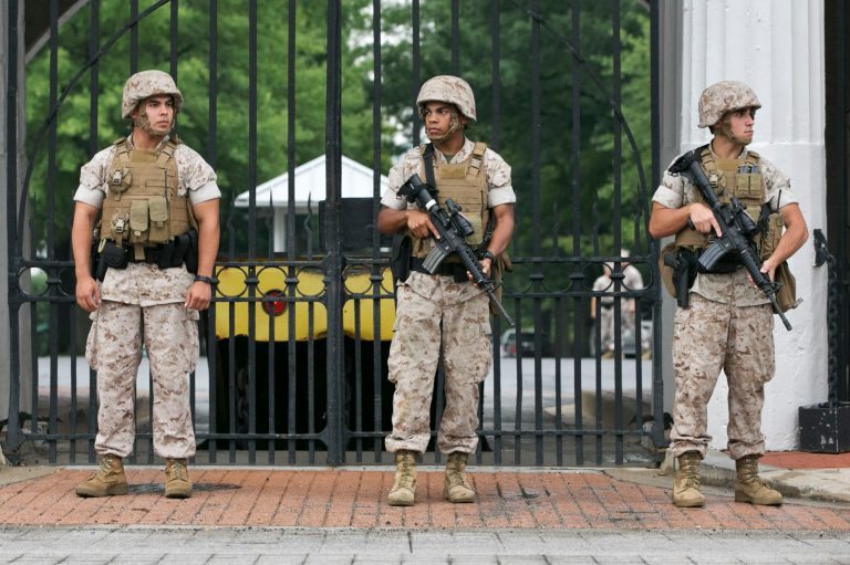While the Pentagon has not put a policy in place to allow troops to carry personal weapons on base for protection, some changes have been made since the Navy yard shooting. (AP Photo)