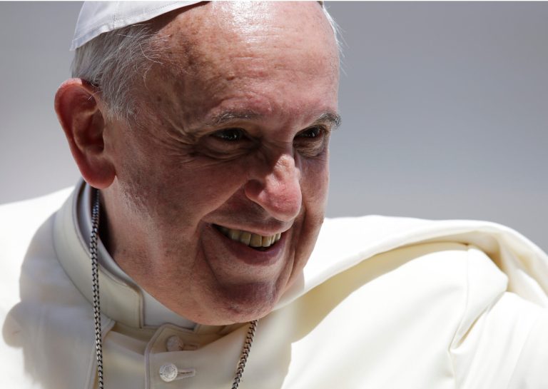 Pope Francis smiles as he leaves St. Peter's Square following his weekly general audience, at the Vatican, Wednesday, June 4, 2014. (AP Photo/Gregorio Borgia)