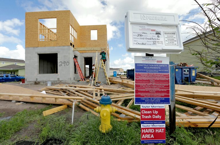 In this May 14, 2014 photo, a new home is under construction in the Winthrop sub-division in Riverview, Fla. he National Association of Home Builders/Wells Fargo releases its monthly index of builder sentiment on Monday, June 16, 2014. (AP Photo/Chris O'Meara)