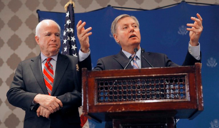 Sens. John McCain, R-Ariz., and Lindsey Graham, R-S.C., said continuing aid programs that benefit Egyptâs interim government and military are âneither in our long-term national interest nor consistent with our values and laws.â (AP/Amr Nabil)
