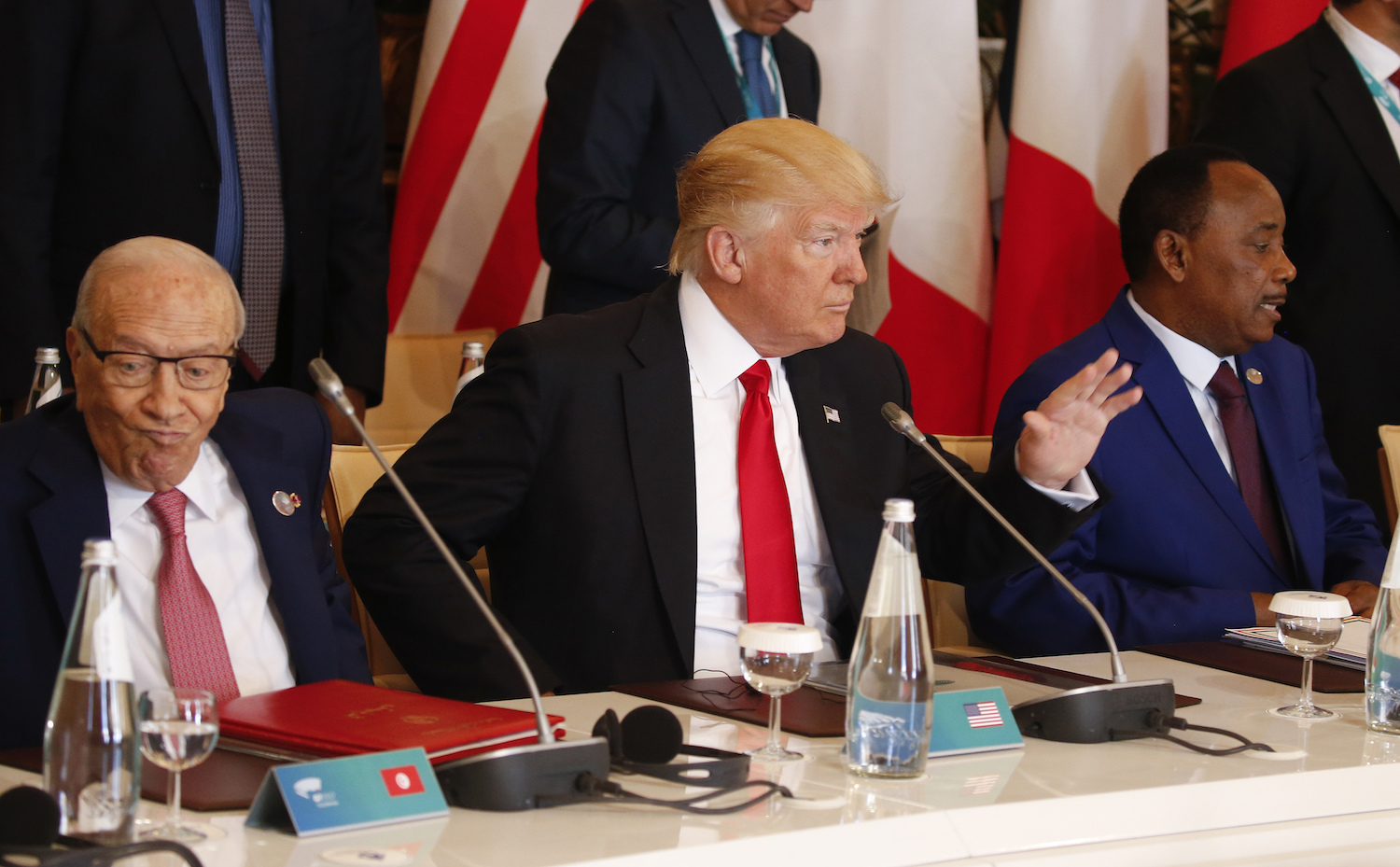 Sean Spicer: Yes, Trump was wearing an earpiece at the G7 summit