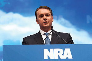 National Rifle Association's Institute for Legislative Action executive director Chris W. Cox speaks during the leadership forum at the National Rifle Association's annual convention Friday, May 3, 2013 in Houston. (AP Photo/Steve Ueckert)