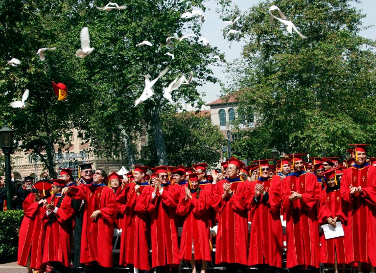 University of Southern California students celebrate at the end of commencement ceremonies on their campus in Los Angeles in May 2011. (AP Photo/Nick Ut)