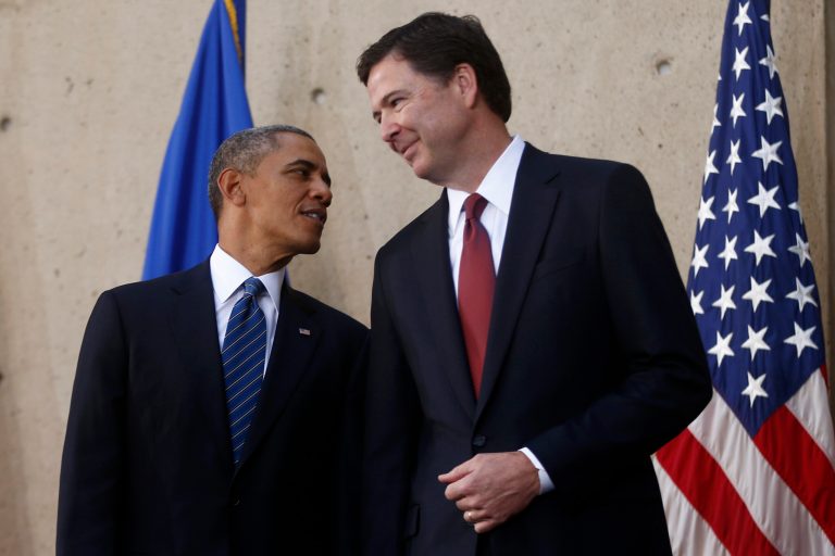 President Barack Obama talks with FBI Director James Comey during Comey's installation as FBI director, Monday, at FBI Headquarters in Washington. (AP/Charles Dharapak)