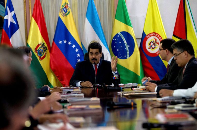 Venezuela's President Nicolas Maduro speaks at a meeting with a South American delegation of foreign ministers at the Miraflores Presidential Palace in Caracas, Venezuela, Tuesday, March 25, 2014. The foreign ministers representing the Union of South American Nations or UNASUR arrived Tuesday aiming to ease political tensions and facilitate dialogue between Venezuela's government and opponents who are urging Maduro's resignation. (AP Photo/Fernando Llano)