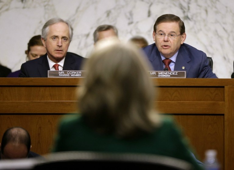 Bob Menendez's endorsement comes as another key Hillary Clinton ally, Virginia Gov. Terry McAuliffe, is being investigated by the FBI over potential campaign finance charges. (AP Photo)