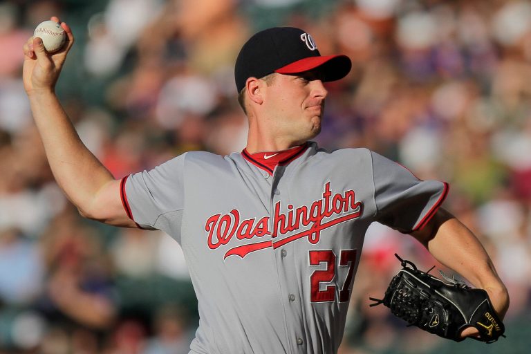 Washington Nationals starting pitcher Jordan Zimmermann (27) pitches to Colorado Rockies' Dexter Fowler during the first inning of a baseball game on Wednesday, June 27, 2012, in Denver, Colo. (AP Photo/Barry Gutierrez)