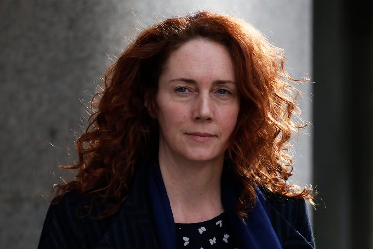 Rebekah Brooks, former News International chief executive leaves the Central Criminal Court in London where she appeared to face charges related to phone hacking, Wednesday, Feb. 19, 2014. Jurors at Britain's phone-hacking trial were told Wednesday that former Prime Minister Tony Blair allegedly offered to work as an unofficial adviser to Rupert Murdoch as revelations of illegal phone hacking engulfed the mogul's media empire. (AP Photo/Sang Tan)