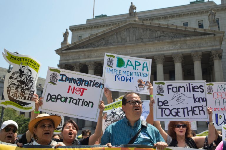 Demonstrators protest against a Supreme Court decision on immigration outside the New York Supreme court, Friday, June 24, 2016, in New York. (AP Photo/Mary Altaffer)