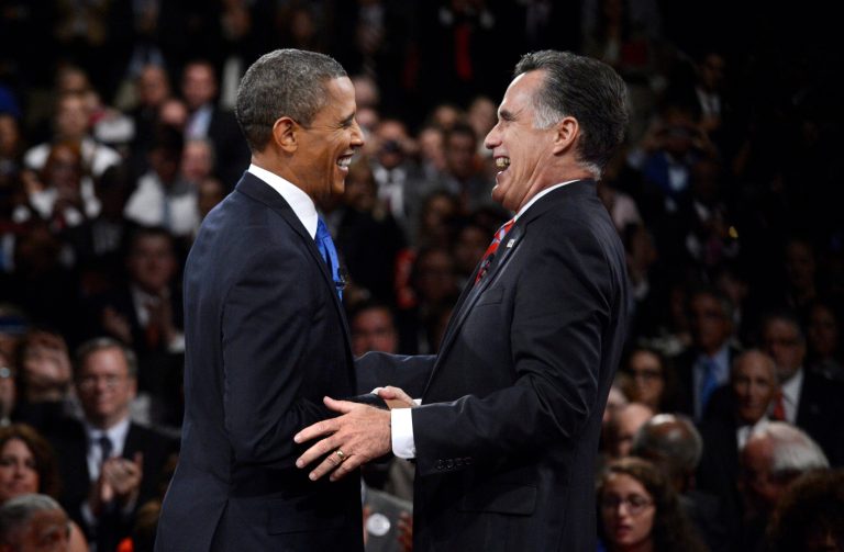 In this Oct. 22, 2012 file photo, President Barack Obama, left, and Republican presidential nominee Mitt Romney laugh at the conclusion of the the third presidential debate at Lynn University in Boca Raton, Fla. (AP Photo/Pool-Michael Reynolds, File)