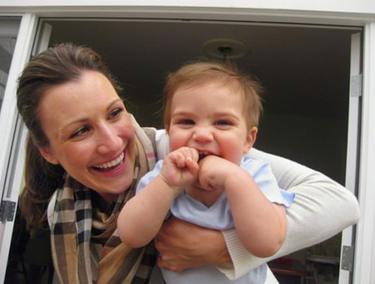 This 2010 photo provided by Stacey Armato of Hermosa Beach, Calif. shows her with her son, Lorenzo. Armato, who was held at a Phoenix airport in 2010 after refusing to have her breast milk X-rayed, said Wednesday, April 23, 2014 that TSA officials have tentatively offered her $75,000, along with promises to retrain agents and clarify its guidelines on sceening breast milk. (AP Photo/Stacey Amato)