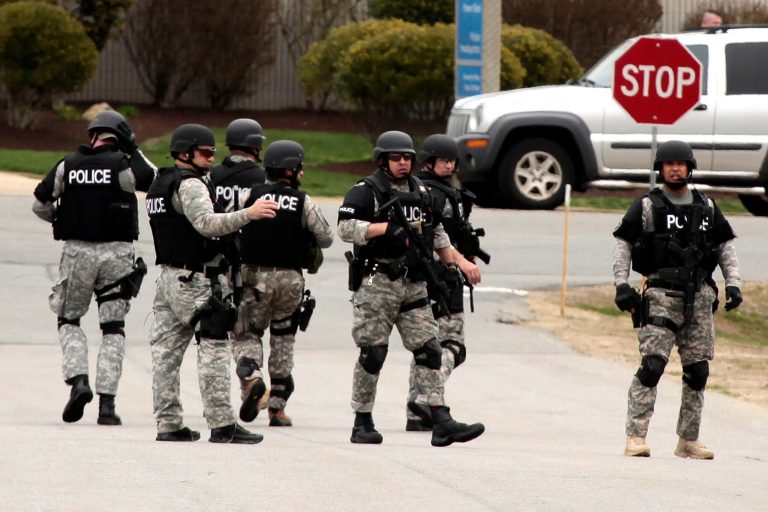 State police move into UMASS Dartmouth on Friday, April 19, 2013, to investigate the dorm room of Dzhokhar Tsarnaev, 19, one of the two suspects wanted for the Boston Marathon bombing on Monday. Students at UMASS-Dartmouth were evacuated from campus on Friday as local and state officials investigate the dorm room of Dzhokhar Tsarnaev, 19, one of the two suspects wanted for the Boston Marathon bombing on Monday. Dzhokhar Tsarnaev was registered as a student at the University of Massachusetts Dartmouth, the school said. The campus closed down along with colleges around the Boston area.  (AP Photo/Standard Times, Peter Pereira)  MANDATORY CREDIT