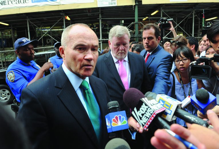 Police Commissioner Raymond Kelly speaks near the Empire State Building following a shooting, Friday, Aug. 24, 2012, in New York. New York City Mayor Michael Bloomberg said some of the victims may have been hit by police bullets as police and the gunman exchanged fire. Police say a recently laid-off worker shot a former colleague to death near the iconic skyscraper and then randomly opened fired on people nearby before firing on police. (AP Photo/ Louis Lanzano)