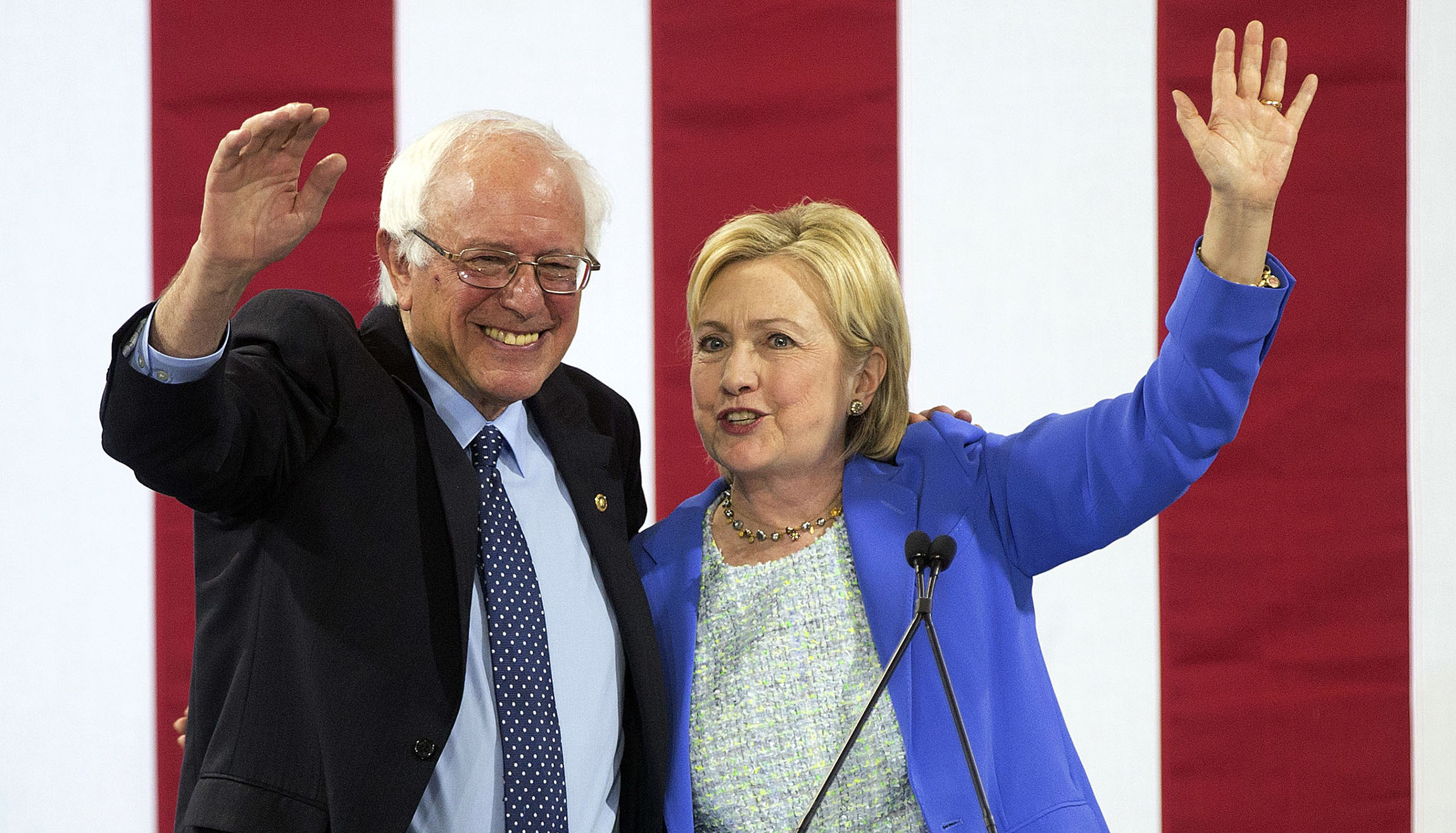 Democrats take major strides toward unifying Clinton and Sanders wings of the party, agree on huge reforms