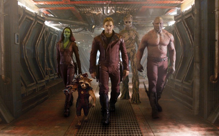 This image released by Disney - Marvel shows, from left, Zoe Saldana, the character Rocket Racoon, voiced by Bradley Cooper, Chris Pratt, the character Groot, voiced by Vin Diesel and Dave Bautista in a scene from 