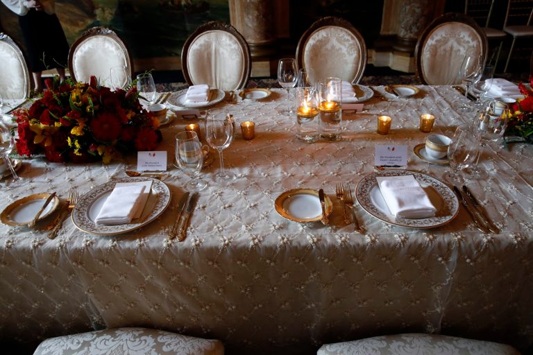 The dinner place setting for President Donald Trump, left, and Chinese President Xi Jinping is photographed at the Mar-a-Lago resort in Palm Beach, Fla., on Thursday, April 6, 2017, ahead of a dinner hosted by Trump . (AP Photo/Alex Brandon)
