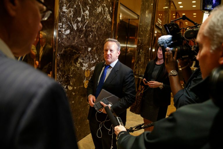 RNC communications director and chief strategist Sean Spicer arrives at Trump Tower in New York. (AP Photo/ Evan Vucci)