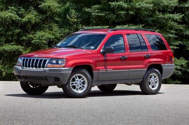 FILE - This undated file photo provided by Chrysler shows the 2002 Jeep Grand Cherokee. U.S. safety regulators are investigating whether a 2012 recall of 745,000 older-model Jeep Grand Cherokees and Libertys to fix air bags is working. The investigation affects Libertys from the 2002 and 2003 model years and Grand Cherokees from 2002 to 2004. (AP Photo/Chrysler, File)