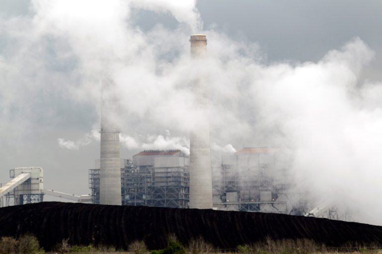 Piles of coal are shown at NRG Energy's W.A. Parish Electric Generating Station in Thompsons, Texas, in March 2011. (AP Photo)
