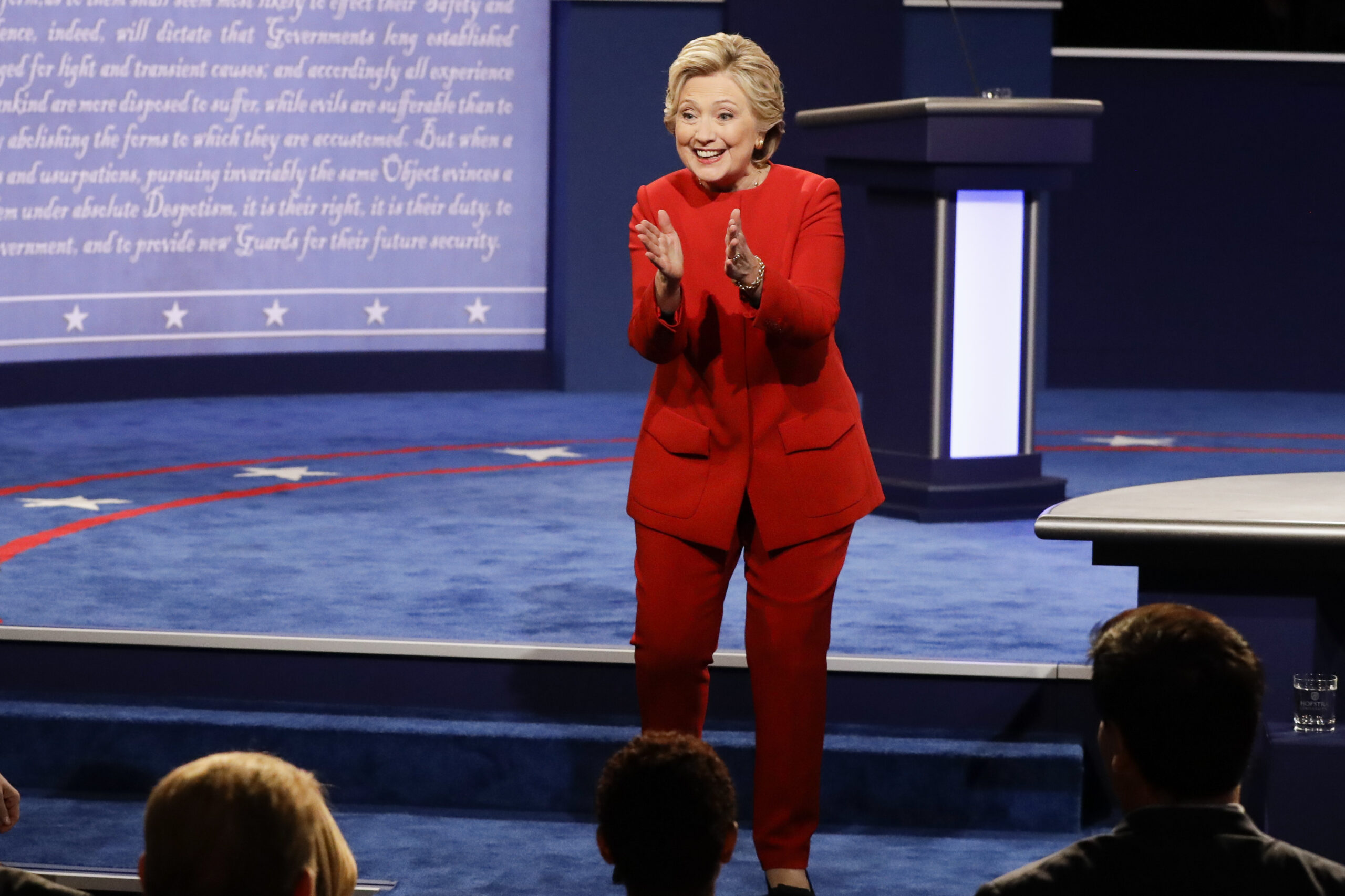 Clinton draws cheers for debate victory lap at rally