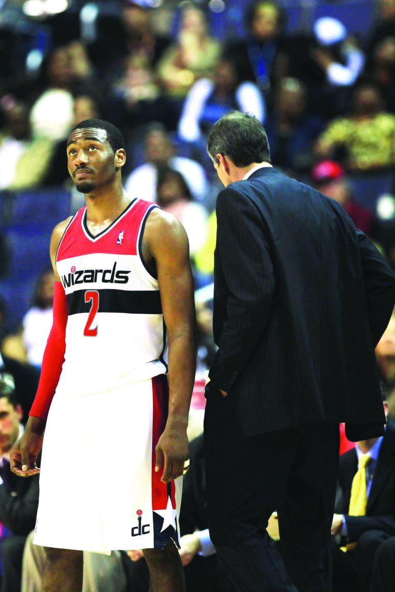 Rob Carr/Getty Images
Wizards point guard John Wall will miss eight weeks with a stress injury to his patella in his left knee.