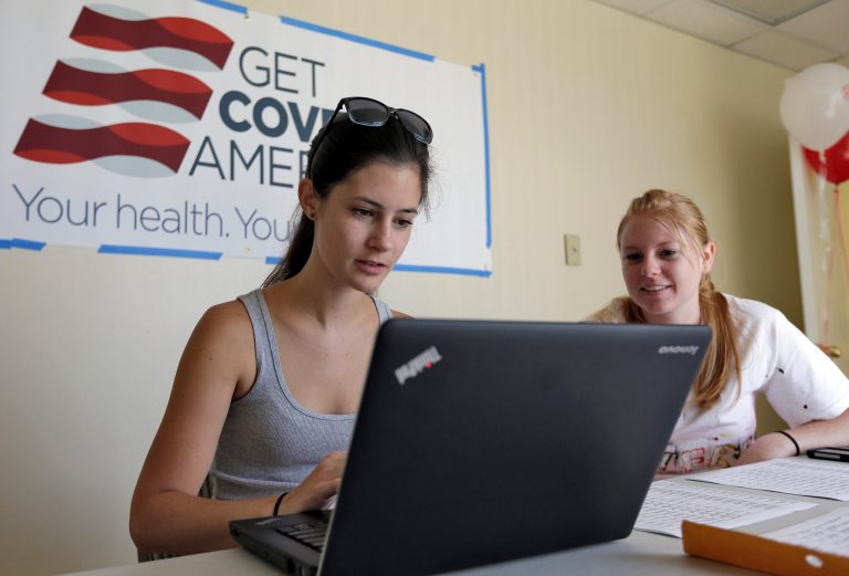 Ashley Hentze, left, of Lakeland, Fla., gets help signing up for the Affordable Care Act from Kristen Nash, a volunteer with Enroll America, a private, nonprofit organization running a grassroots campaign to encourage people to sign up for health care, on Tuesday.ÃÂ President Obama faces a dual challenge in the months ahead: Convince uninsured Americans to sign up for Obamacare and keep worried Democrats on board as the administration enacts his health care overhaul.ÃÂ (AP Photo/Chris O'Meara)