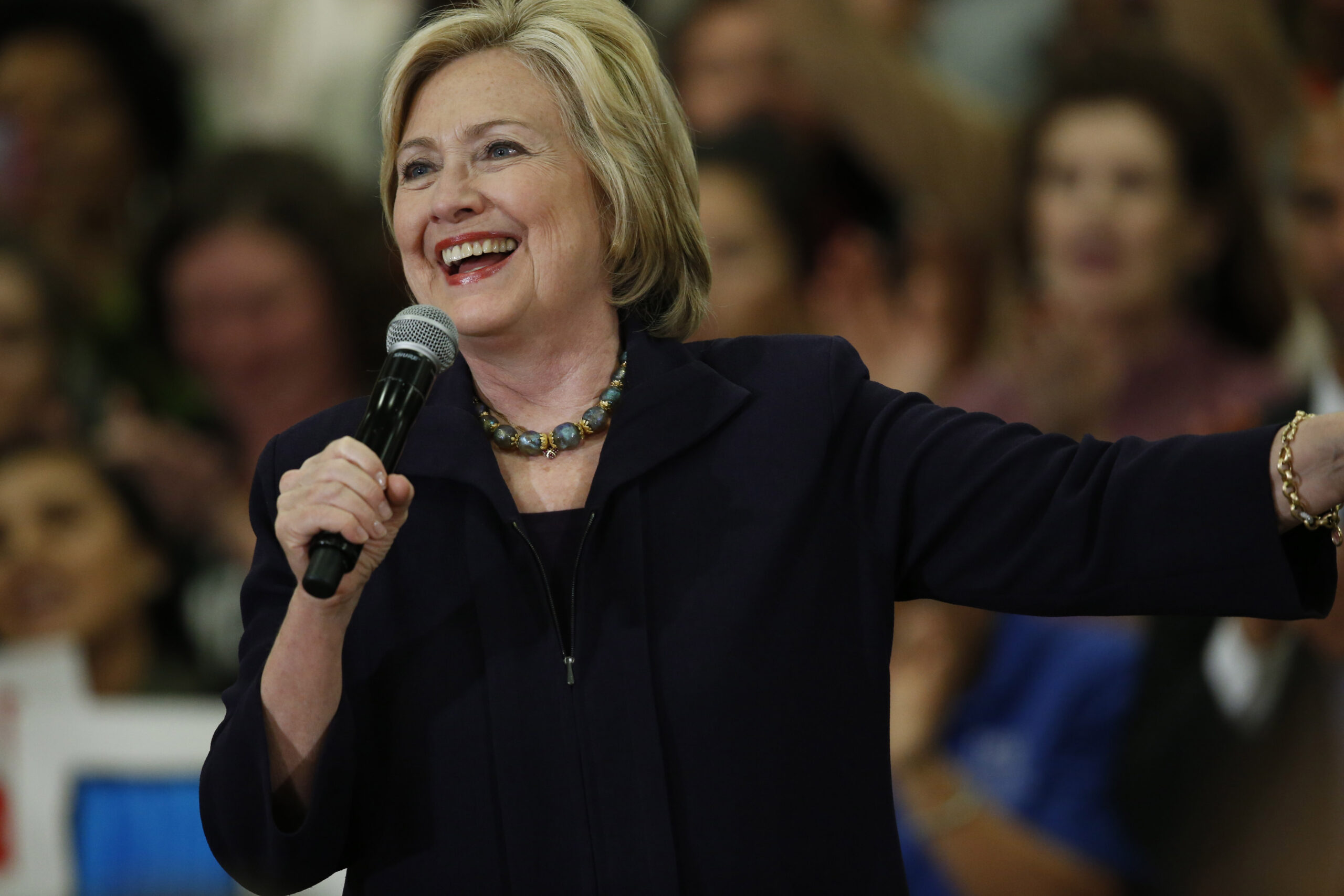 Why did Hillary Clinton visit a school with only 119 students?