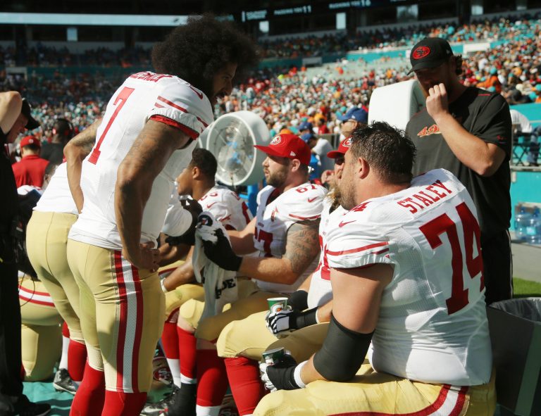 Colin Kaepernick, ignoring the boos. (AP Photo/Lynne Sladky)
