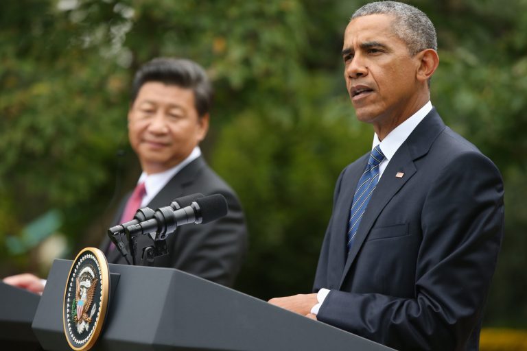 President Barack Obama and Chinese President Xi Jinping participate in a joint news conference in the Rose Garden of the White House in Washington, Friday. (AP Photo/Andrew Harnik)