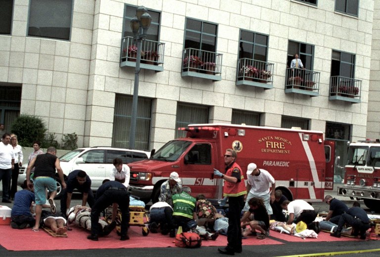   FILE - This July 16, 2003, file photo shows emergency officials assisting injured pedestrians after a car plowed through a crowded farmers market in Santa Monica, Calif. Many motorists don't know it, but it's likely that every time they get behind the wheel there's a snitch along for the ride. In the next few days, the National Highway Traffic Safety Administration is expected to propose long-delayed regulations requiring auto manufacturers include event data recorders, better known as 