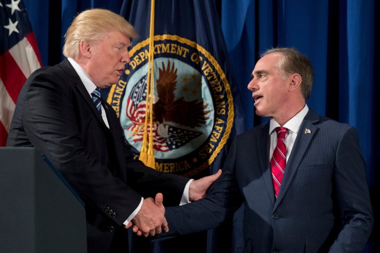 President Trump signed into law a bill providing over $2 billion to open new Veterans Affairs department medical facilities and fund care for veterans seeking medical care outside the government system on Saturday. (AP Photo/Andrew Harnik)