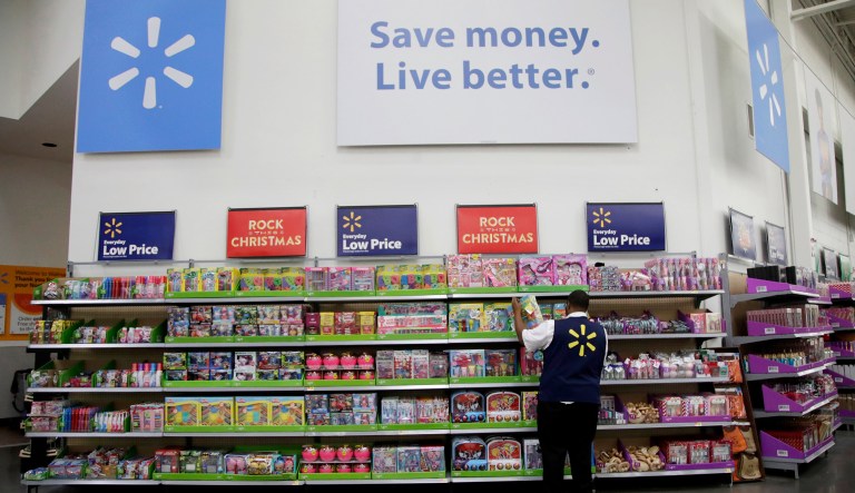 Walmart announced the starting wage rate will be bumped to $11 an hour and eligible employees will receive a cash bonus of up to $1,000. (AP Photo/Julio Cortez)
